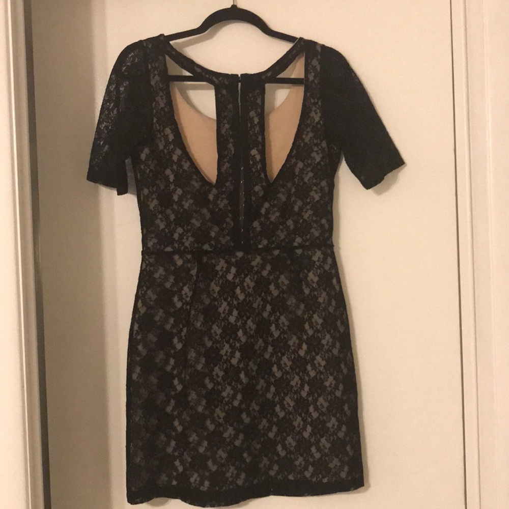 Black lace cutout dress with muse slip